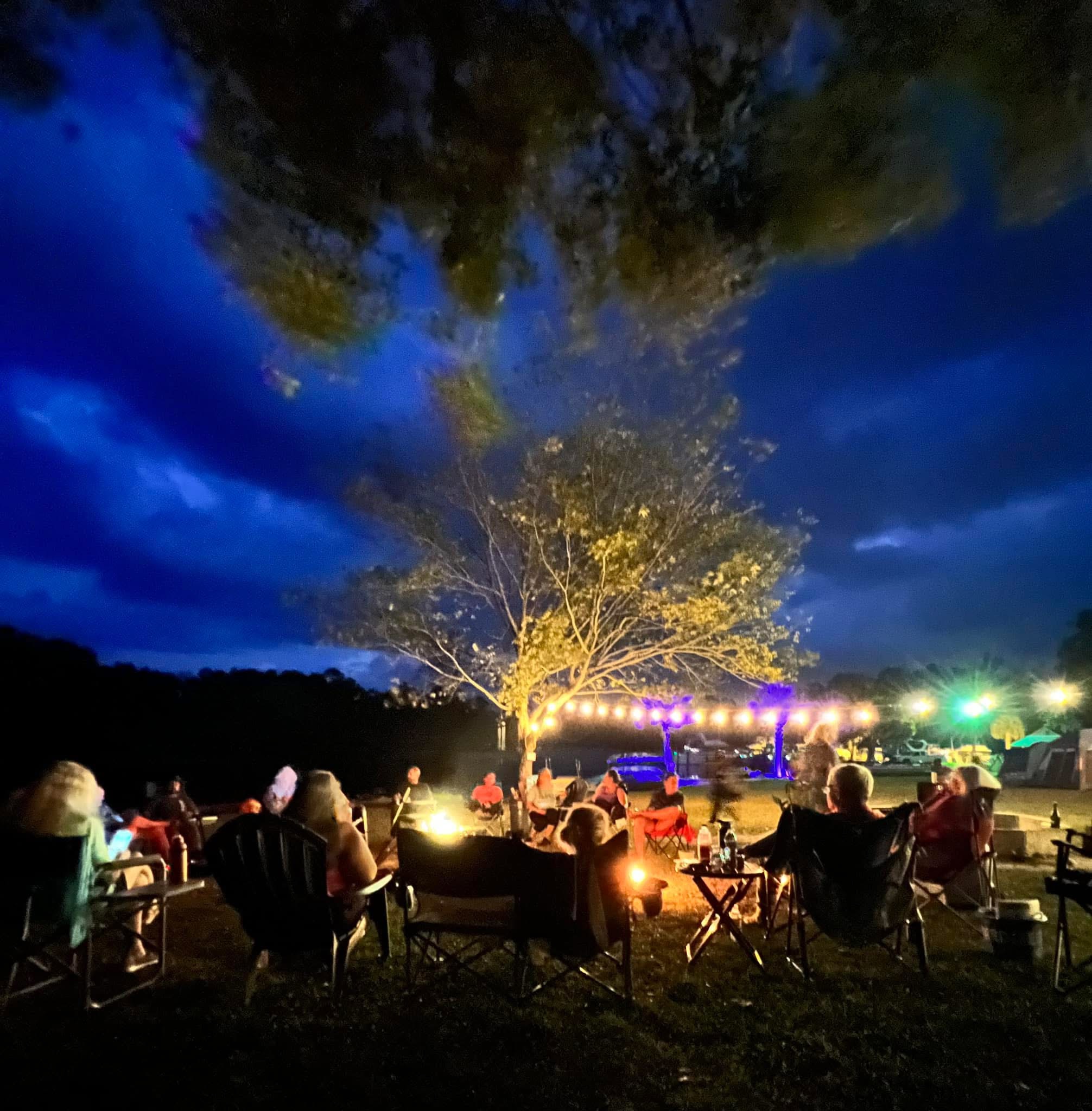 Evening around the campfire, from Dawn’s festival page